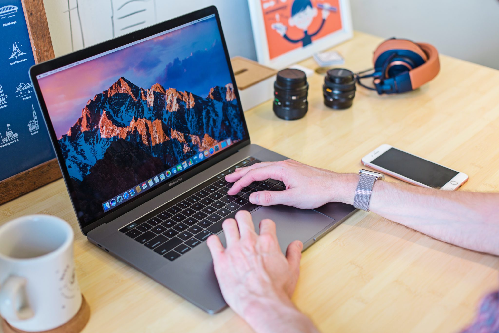 Person using a MacBook on a table