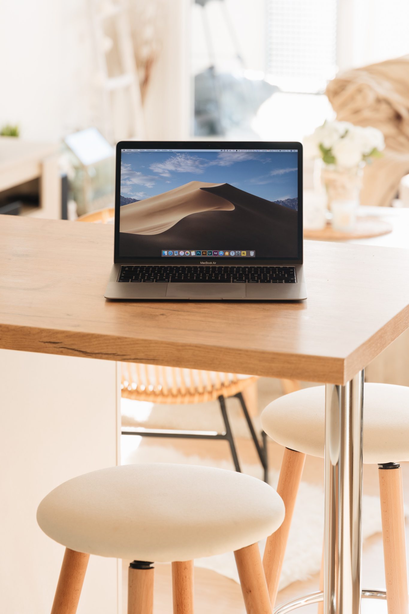 MacBook on a wooden table