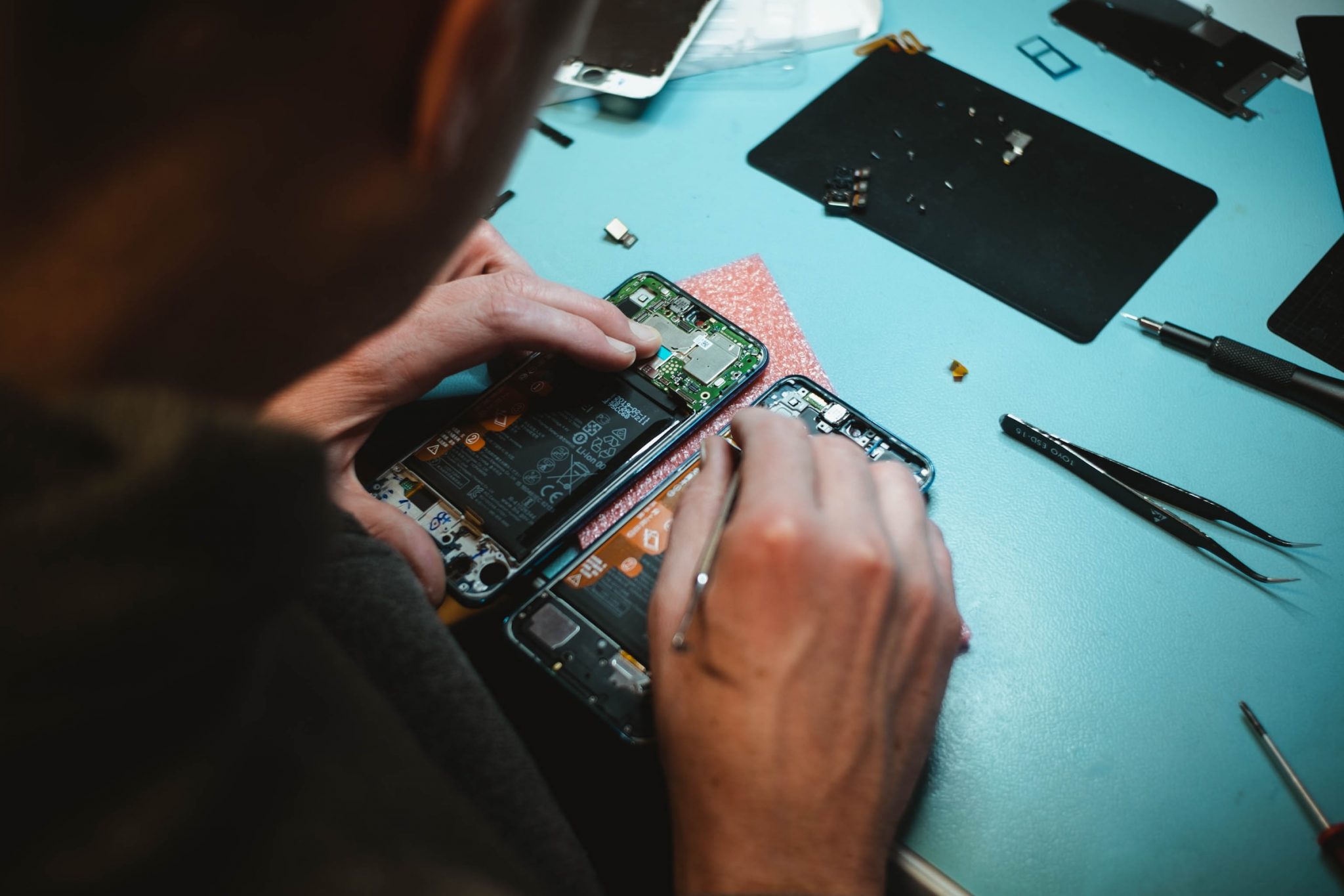 Technician repairing a phone