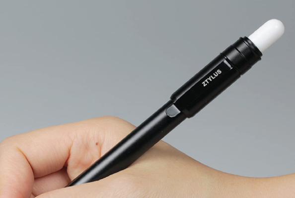 Hand holding an Apple Pencil with the Ztylus Metal Protective Case